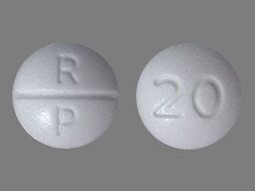 FDA has not classified the drug for risk during pregnancy. . White round pill with r p on one side and 20 on the other